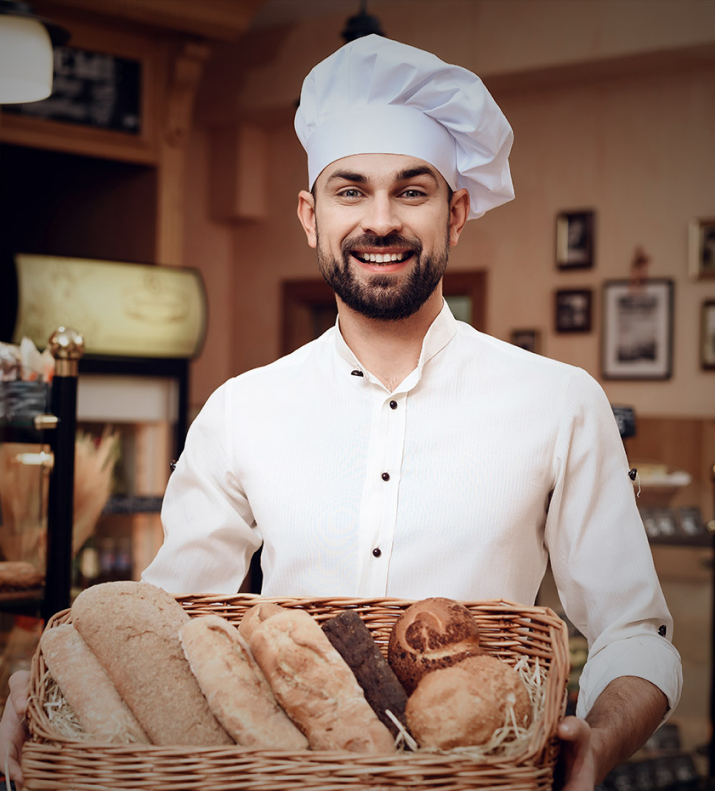 A happy man with breads